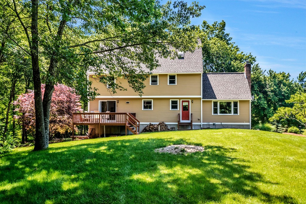 178 Reed Farm Road Boxborough, MA 01719 - Photo 28 of 30 front view of a house with a yard