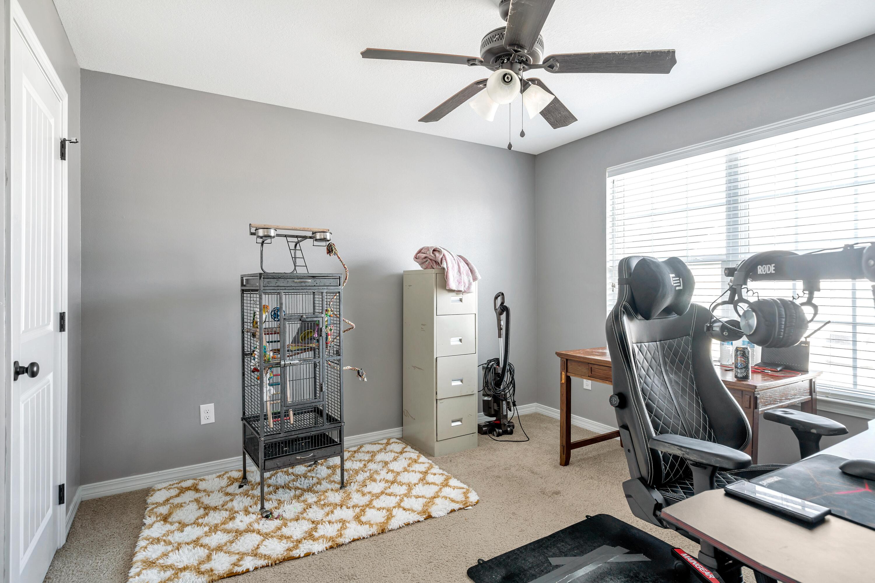 505 Eisenhower Drive Crestview, FL 32539 - Photo 26 of 39 a view of a workspace with furniture and a window