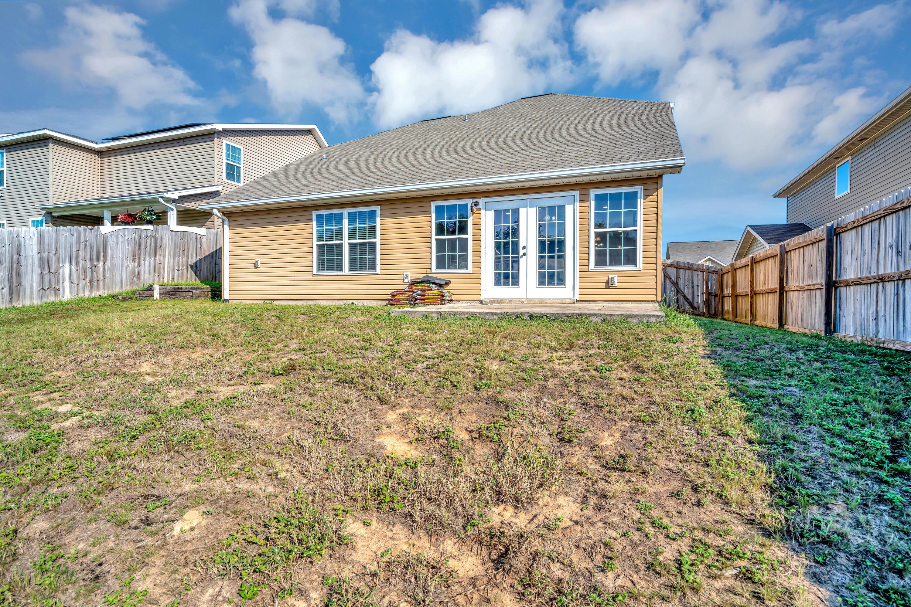 505 Eisenhower Drive Crestview, FL 32539 - Photo 38 of 39 front view of a house with a yard