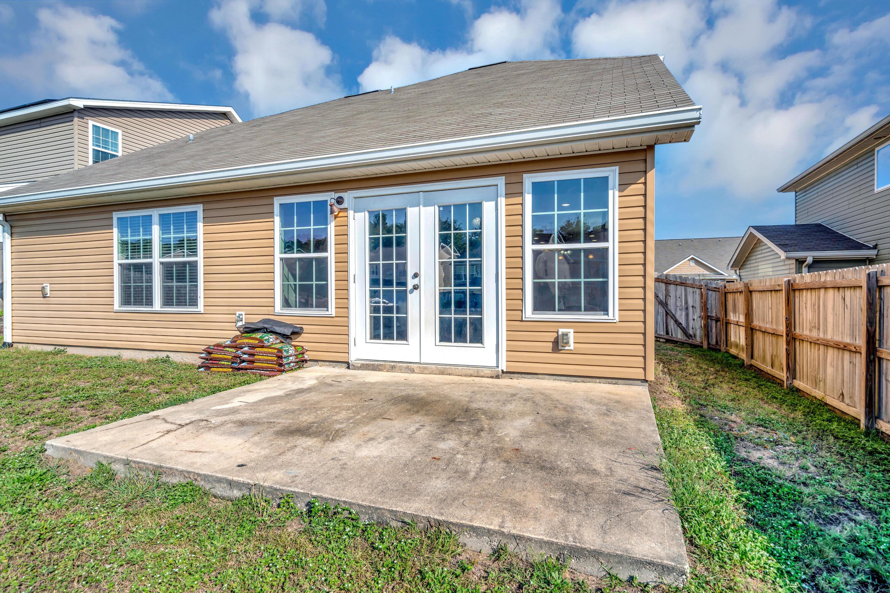 505 Eisenhower Drive Crestview, FL 32539 - Photo 39 of 39 a view of a house with backyard and porch