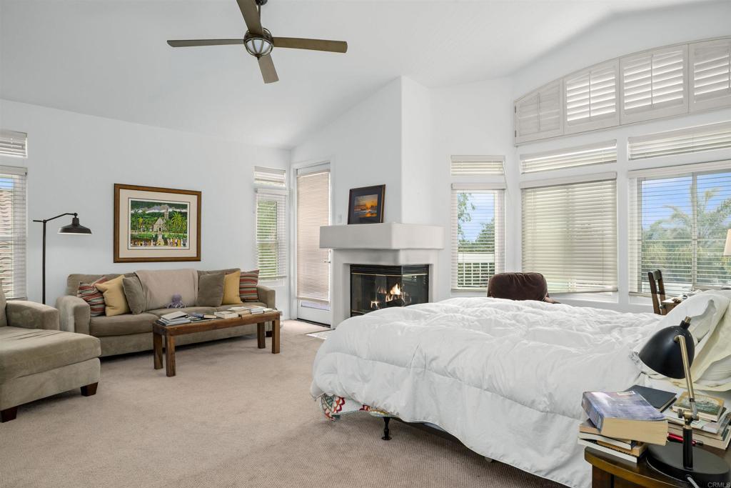 4992 Lassen Drive Oceanside, CA 92056 - Photo 13 of 27 a living room with furniture and a fireplace