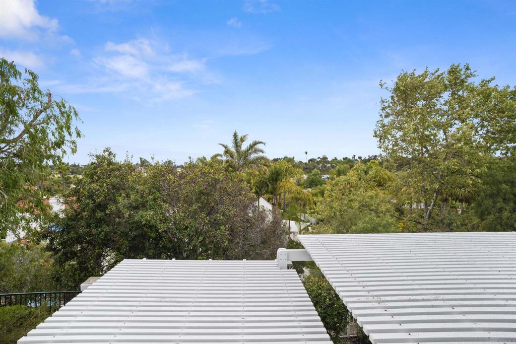 4992 Lassen Drive Oceanside, CA 92056 - Photo 19 of 27 a view of a balcony with trees