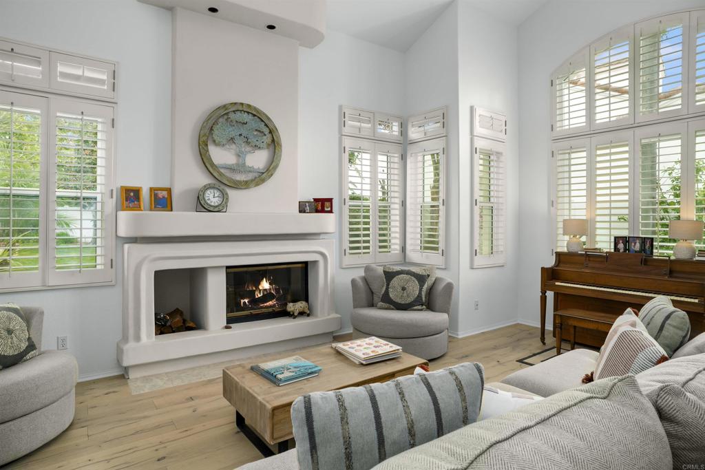 4992 Lassen Drive Oceanside, CA 92056 - Photo 5 of 27 a living room with furniture and a fireplace
