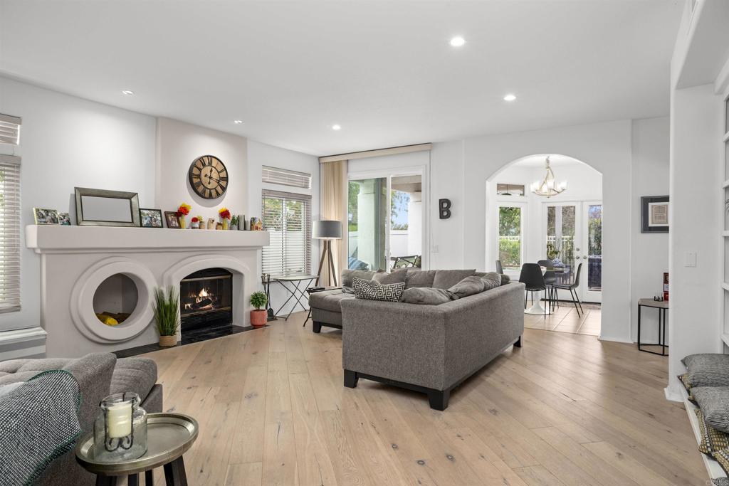 4992 Lassen Drive Oceanside, CA 92056 - Photo 10 of 27 a living room with furniture and a fireplace