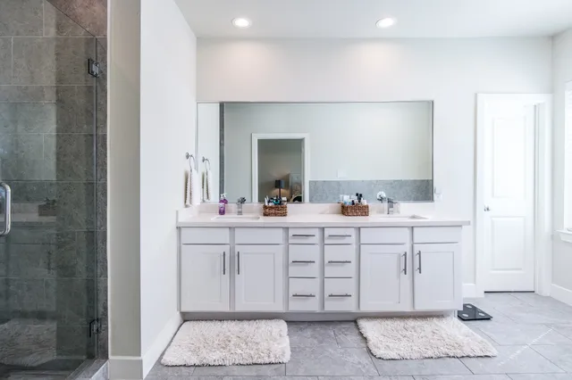 a bedroom with a workspace