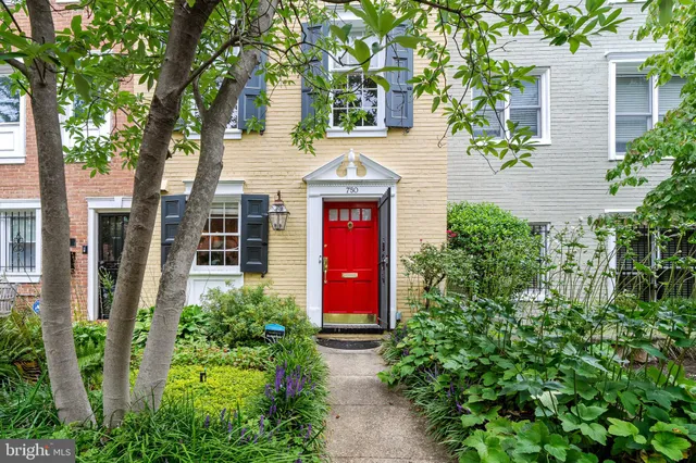 front view of a house with an outdoor space