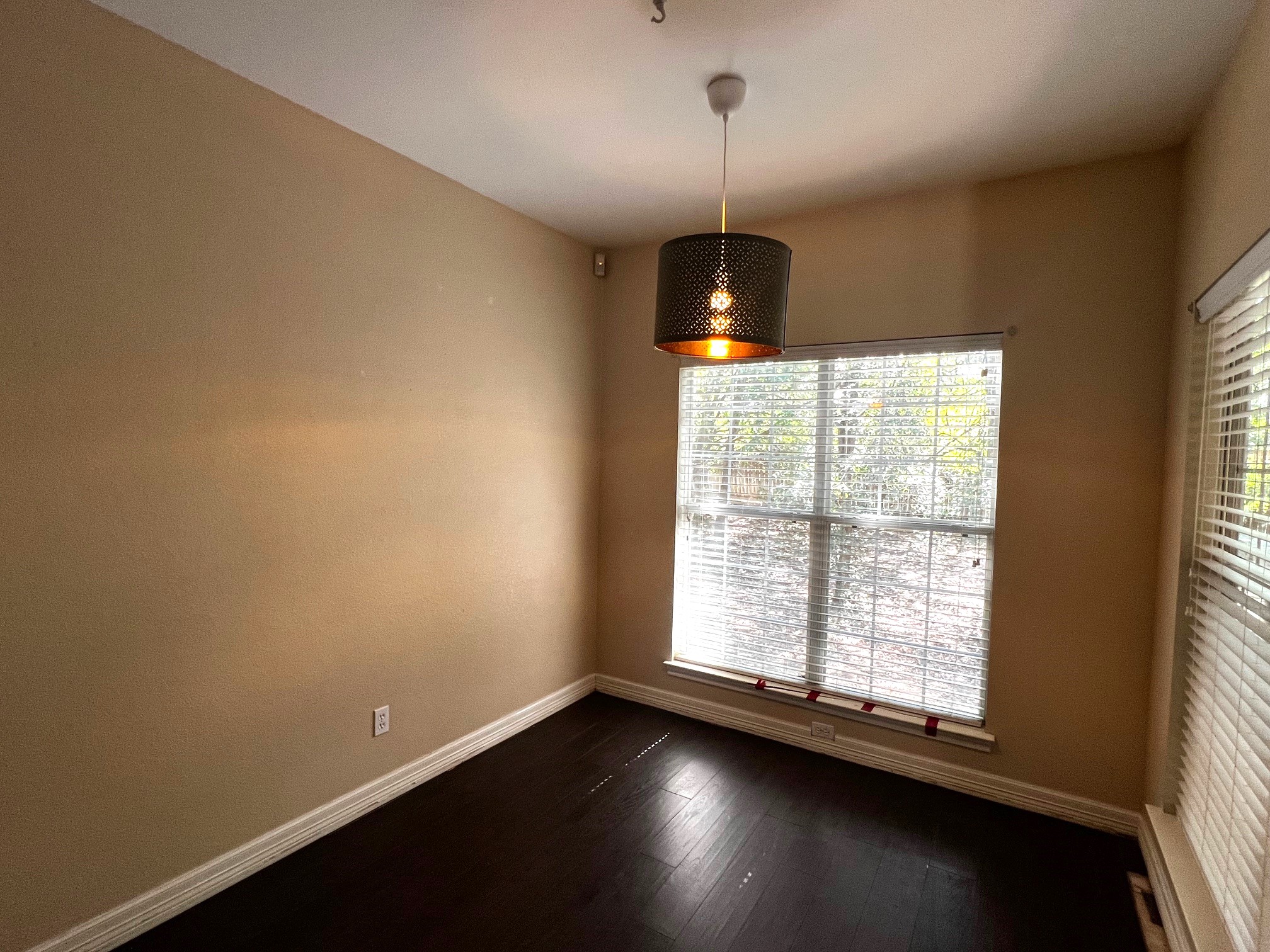 170 Rose Mayer Loop La Grange, TX 78945 - Photo 11 of 19 a view of an empty room with wooden floor and a window