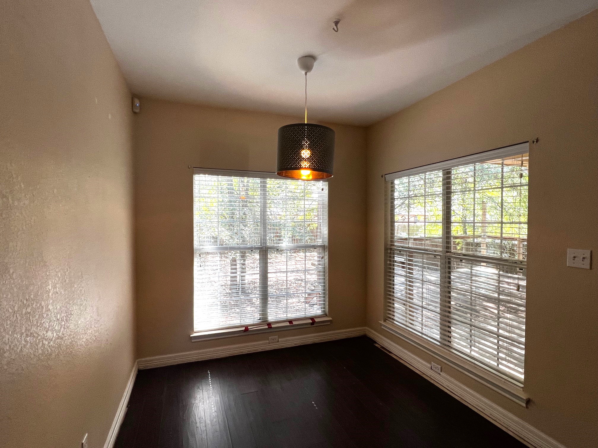 170 Rose Mayer Loop La Grange, TX 78945 - Photo 12 of 19 a view of an empty room with wooden floor and a window