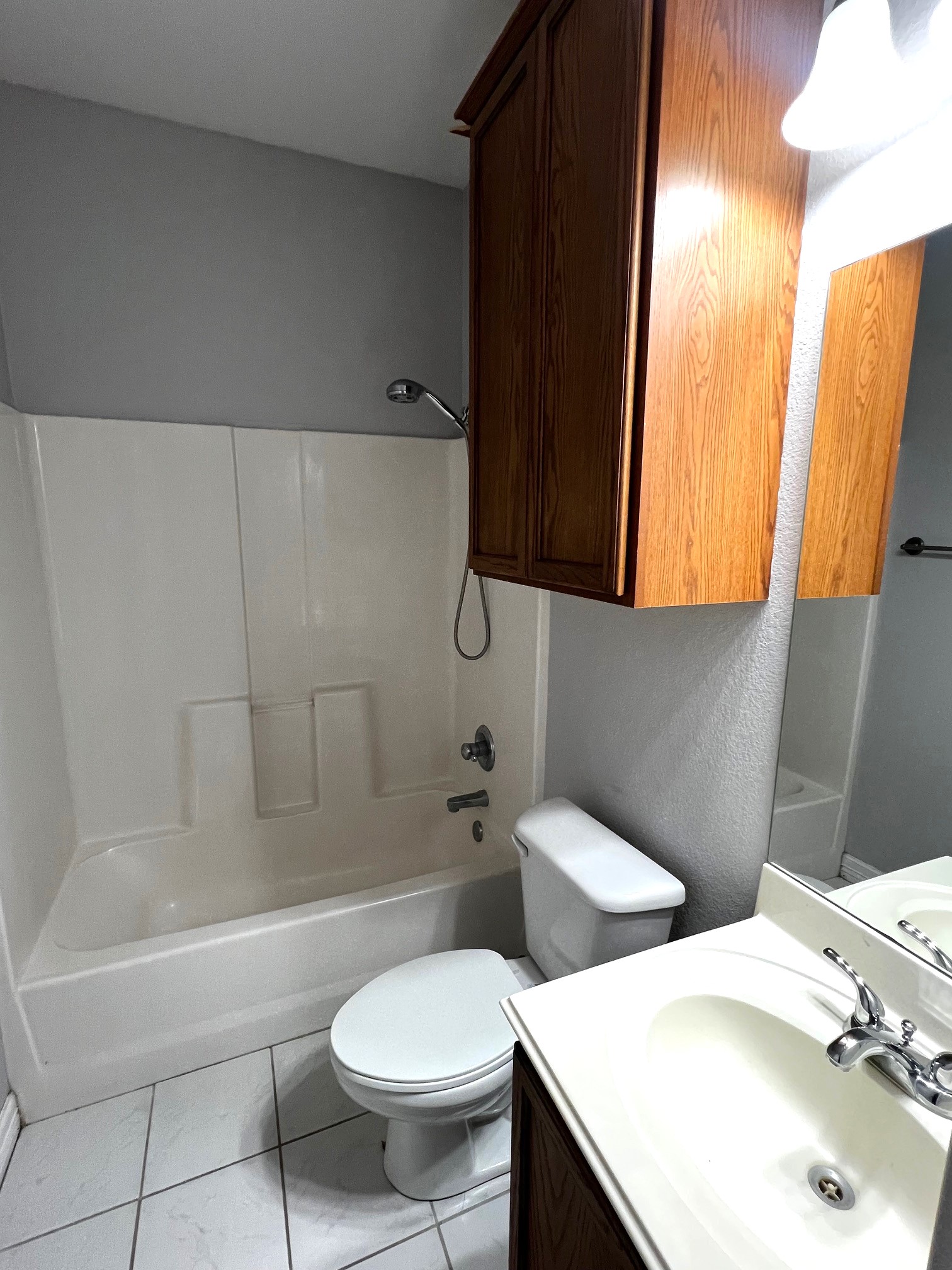 170 Rose Mayer Loop La Grange, TX 78945 - Photo 15 of 19 a white toilet sitting next to a bathroom sink and tub