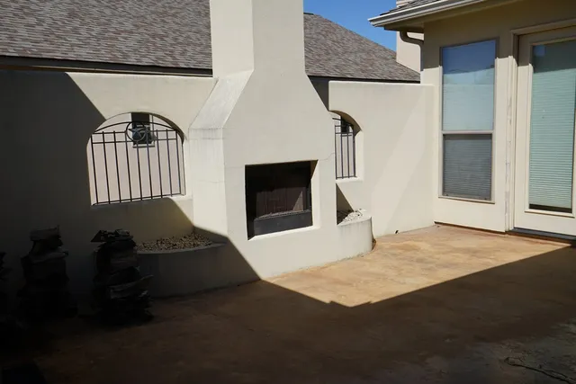 a view of a livingroom with furniture and staircase