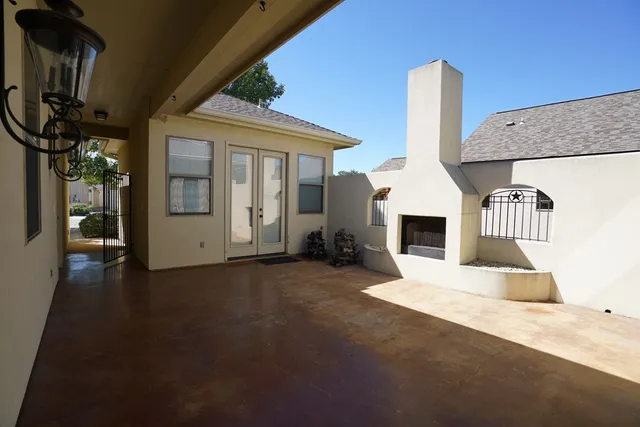 a view of a house with a patio