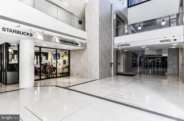 a view of a entryway with building and living room