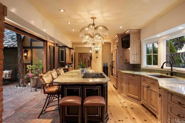 a view of a dining room with furniture and window