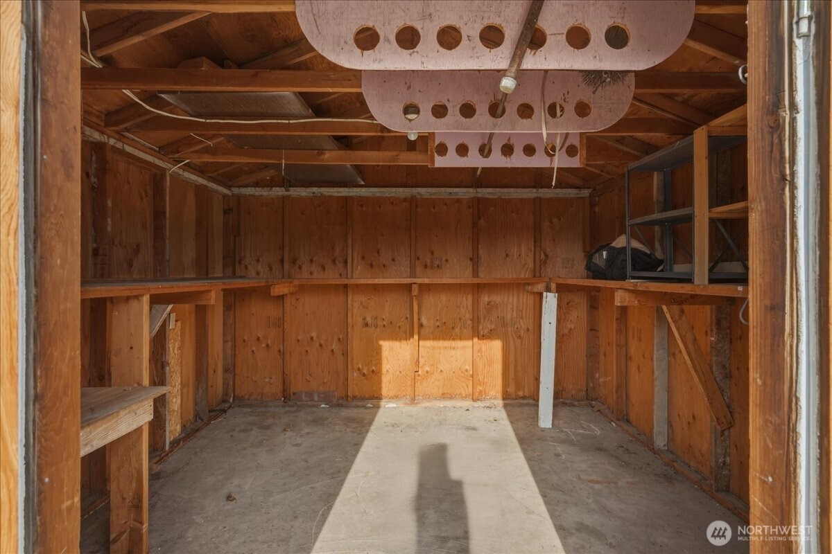 309 West Walnut Street Waterville, WA 98858 - Photo 24 of 28 a view of walk in closet with clothes and shoes