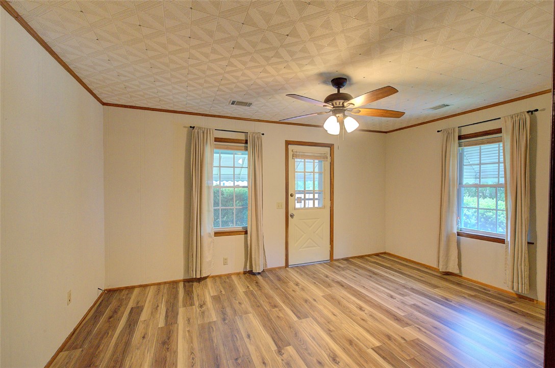 5064 Keowee School Road Seneca, SC 29672 - Photo 11 of 49 This bright living space features durable flooring and ample natural light, perfect for everyday living.