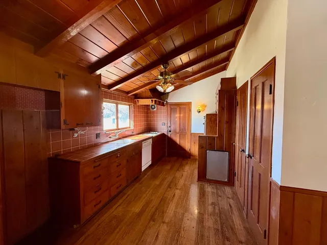 a large kitchen with lot of counter space
