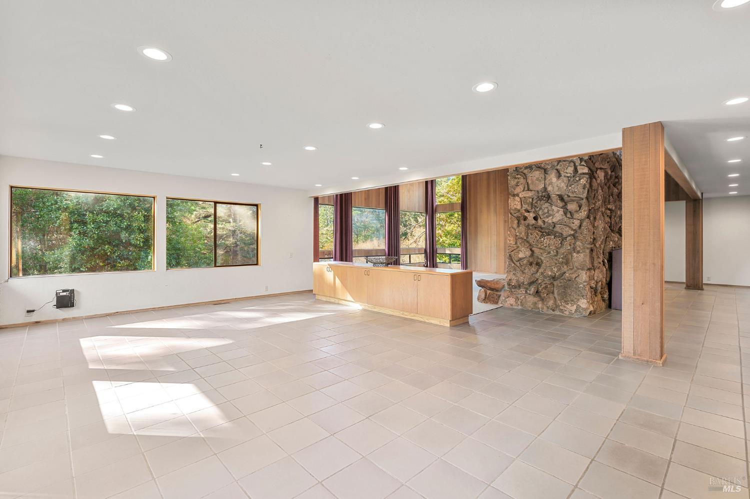 36029 Timber Ridge Road The Sea Ranch, CA 95497 - Photo 19 of 59 a view of an empty room with a window and outside view
