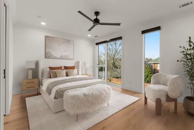 a bed room with a bed and a couch