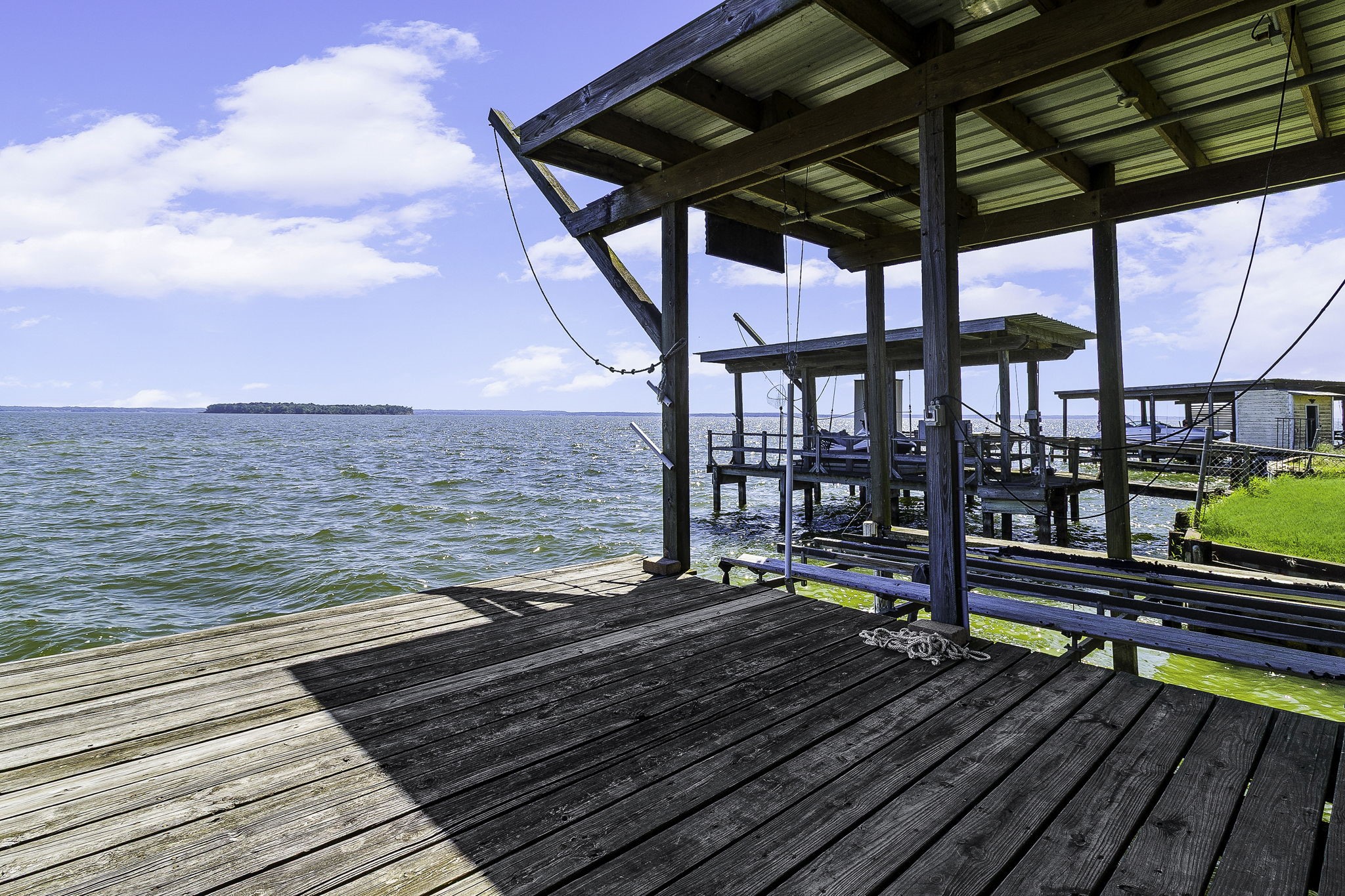 536 Weavers Cove Road Livingston, TX 77351 - Photo 29 of 44 a view of a balcony with wooden floor