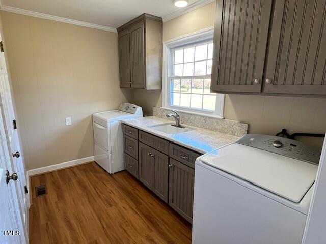971 Rock Spring Church Road Henderson, NC 27537 - Photo 12 of 39 a utility room with a sink dryer and washer