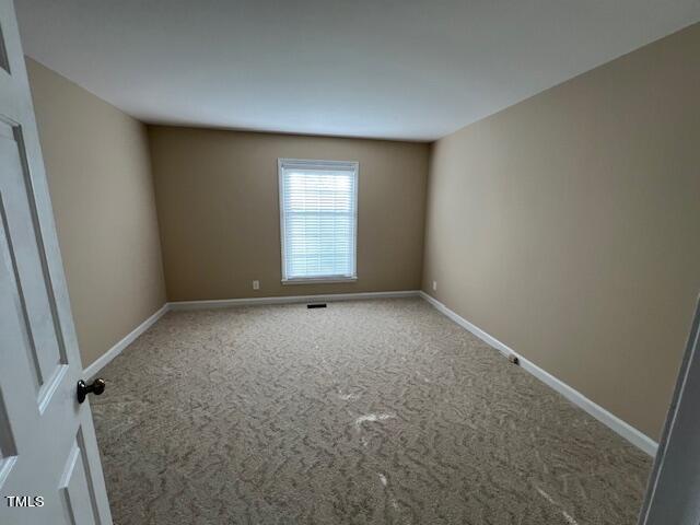 971 Rock Spring Church Road Henderson, NC 27537 - Photo 23 of 39 an empty room with a window