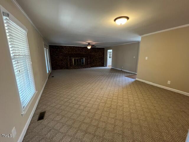 971 Rock Spring Church Road Henderson, NC 27537 - Photo 4 of 39 an empty room with windows and entrance
