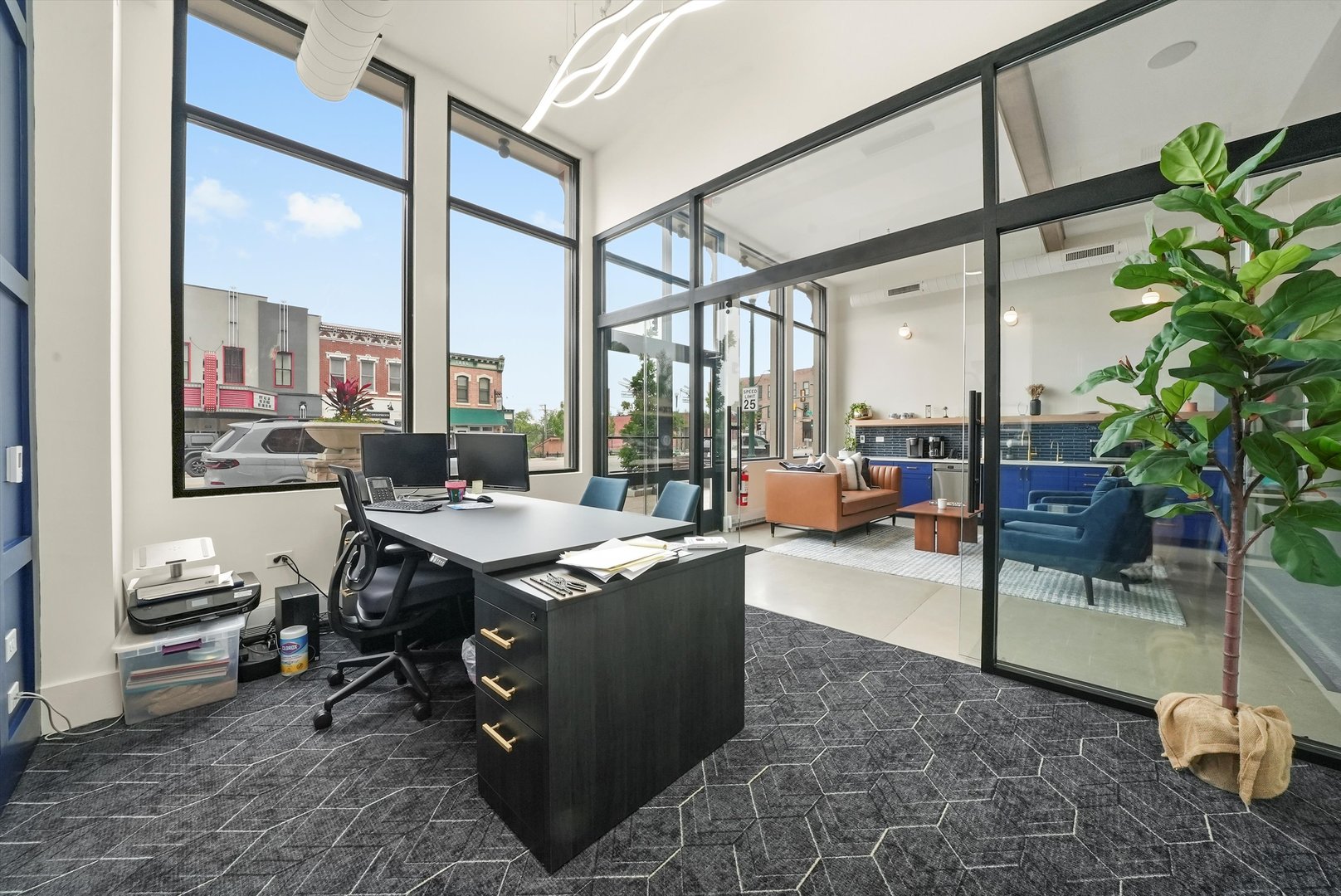 1016 South State Street Lockport, IL 60441 - Photo 14 of 67 a view of a workspace with furniture and a potted plant
