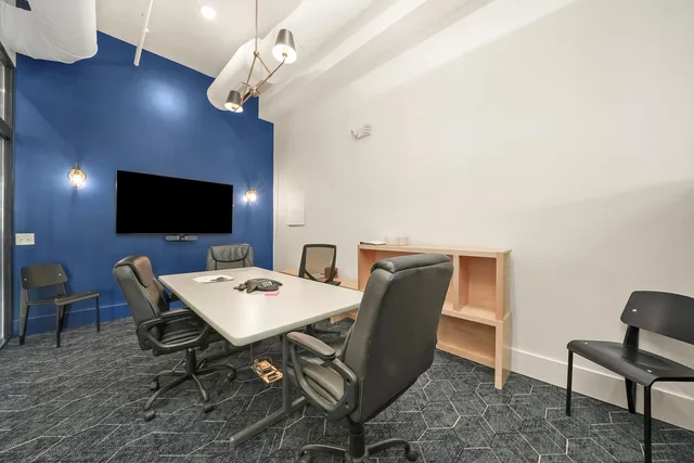 a view of a big room with wooden floor