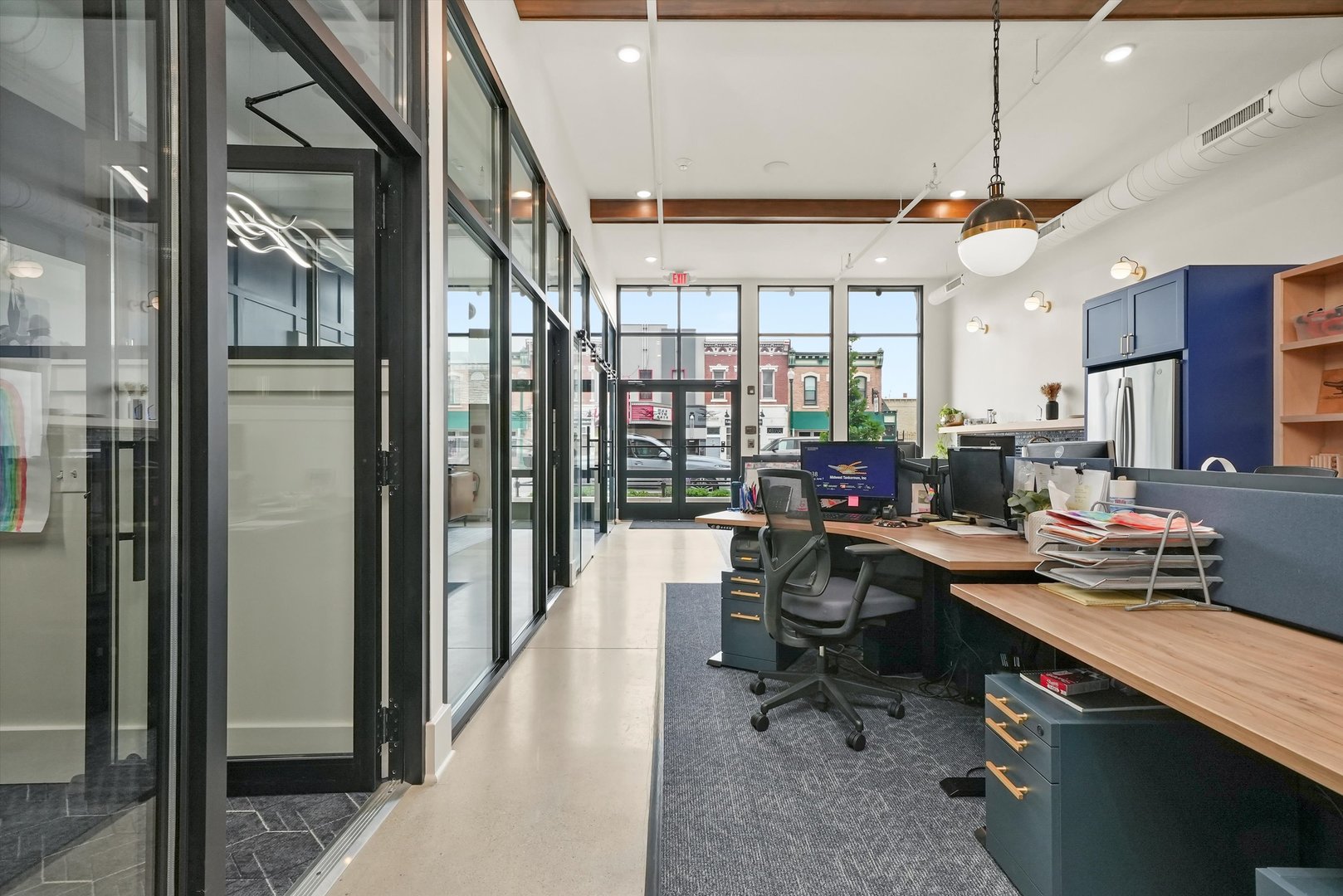 1016 South State Street Lockport, IL 60441 - Photo 21 of 67 a work place with a large window and wooden floor