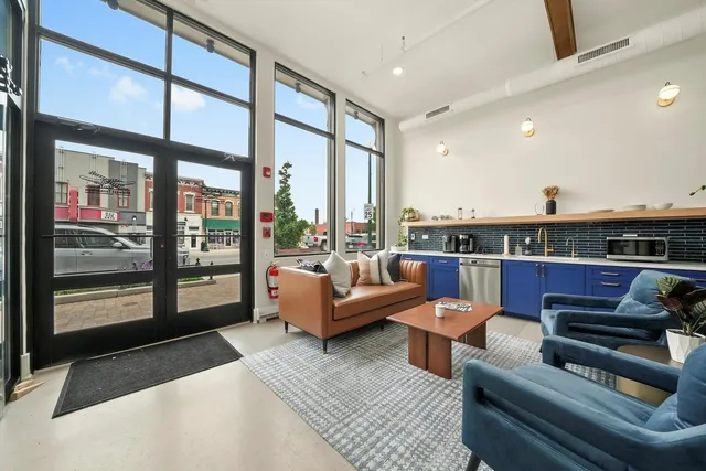 a workspace with furniture and window