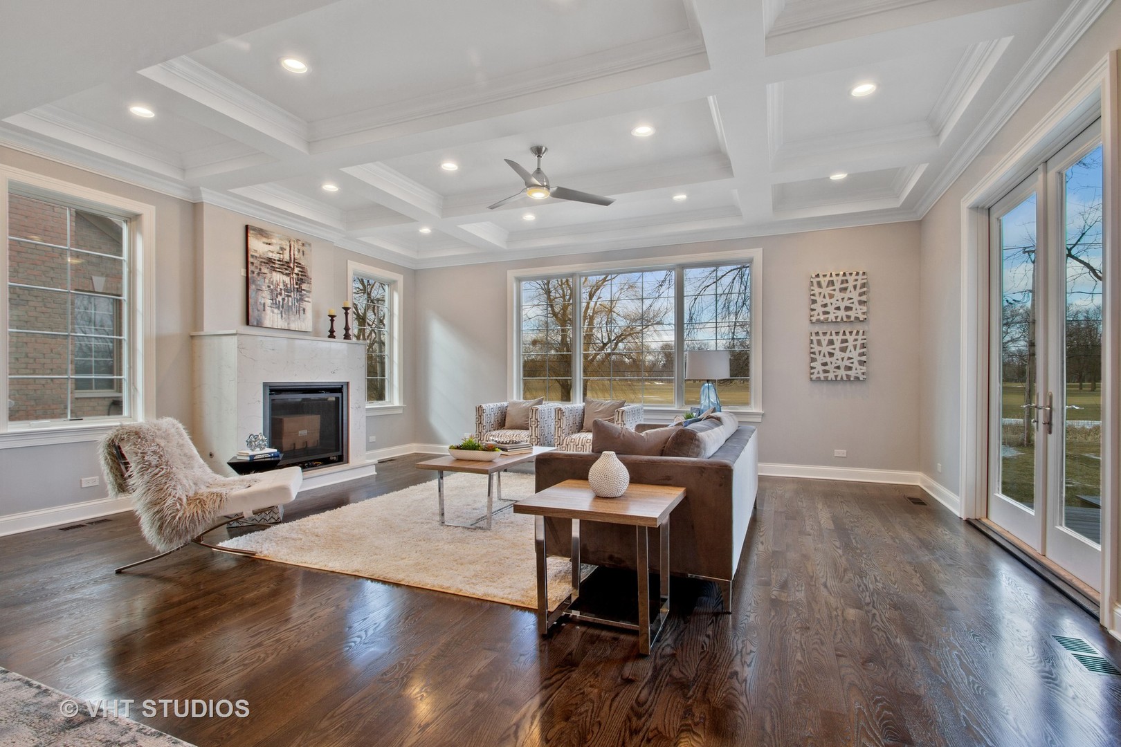 2800 Central Road Glenview, IL 60025 - Photo 2 of 31 a living room with furniture a large window and a fireplace