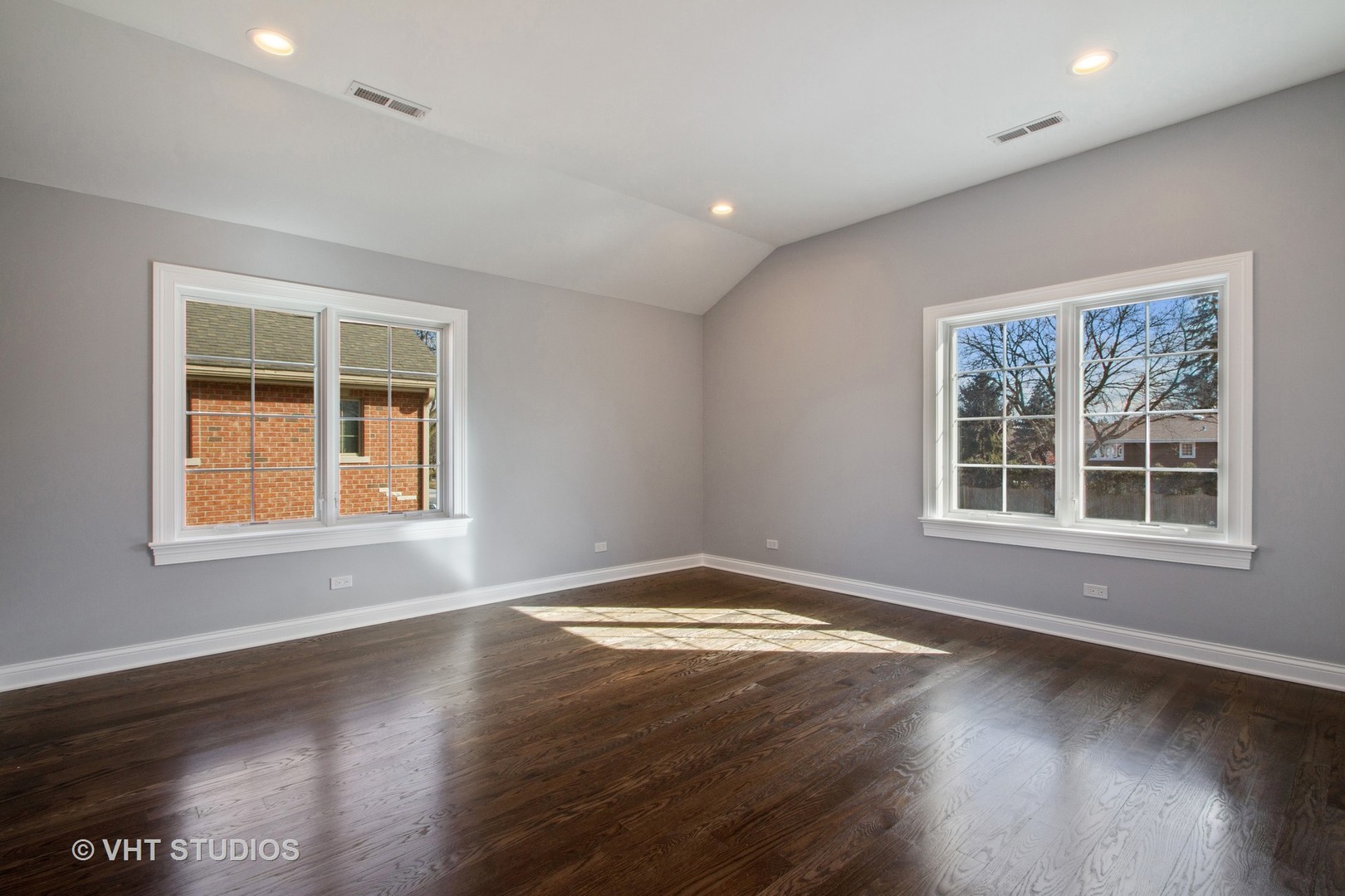 2800 Central Road Glenview, IL 60025 - Photo 15 of 31 a view of an empty room with wooden floor and a window