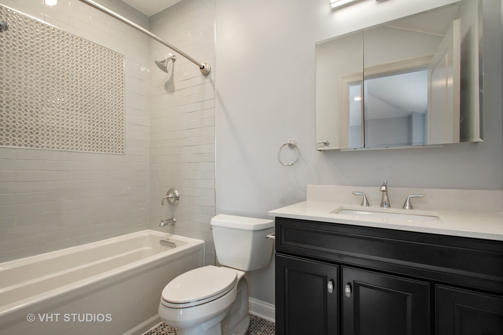 2800 Central Road Glenview, IL 60025 - Photo 16 of 31 a bathroom with a sink a toilet and a bathtub