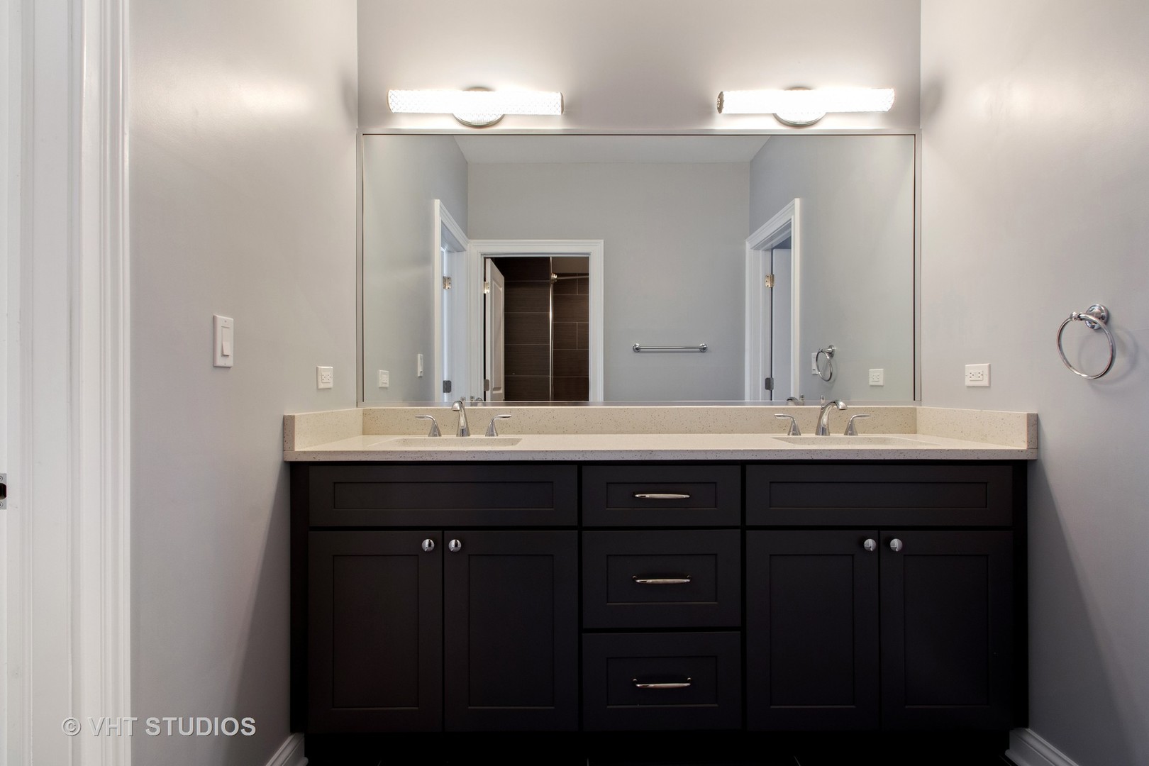 2800 Central Road Glenview, IL 60025 - Photo 20 of 31 a bathroom with a double vanity sink and a mirror