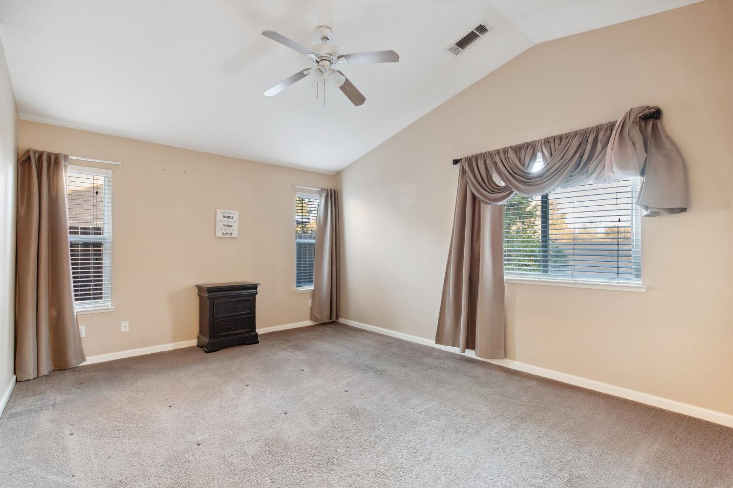 257 Toschi Drive Madera, CA 93637 - Photo 19 of 40 a view of an empty room with a window