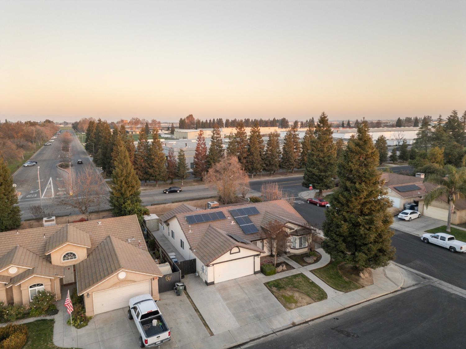 257 Toschi Drive Madera, CA 93637 - Photo 30 of 40 an aerial view of a residential houses with city view
