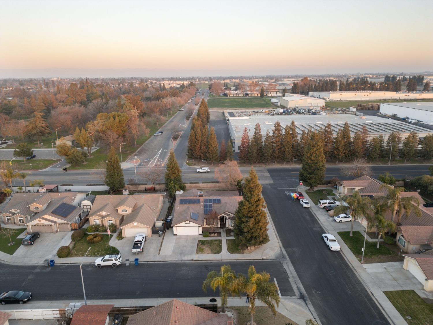 257 Toschi Drive Madera, CA 93637 - Photo 31 of 40 an aerial view of a house with a lake view