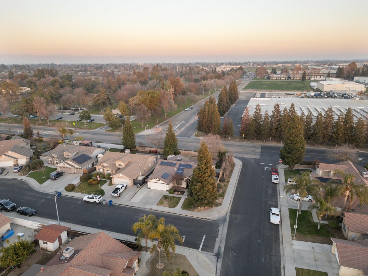 257 Toschi Drive Madera, CA 93637 - Photo 32 of 40 an aerial view of a city with lots of residential buildings