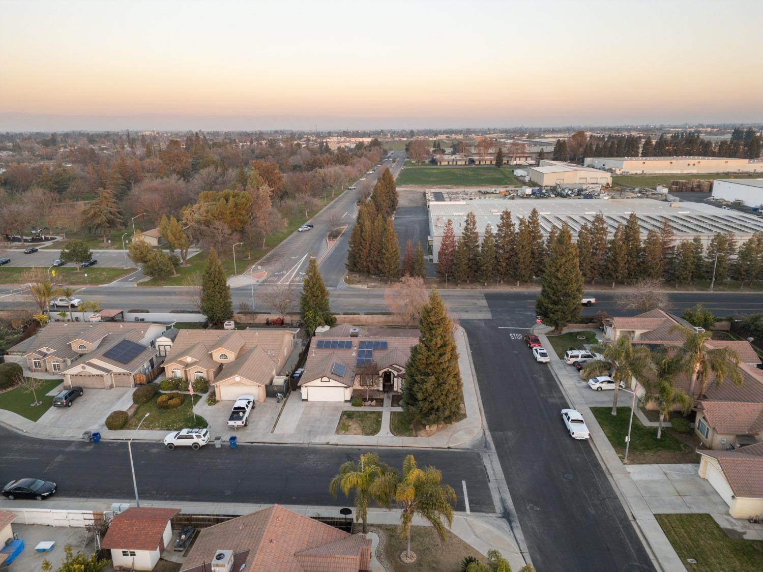 257 Toschi Drive Madera, CA 93637 - Photo 33 of 40 an aerial view of a house with a lake view