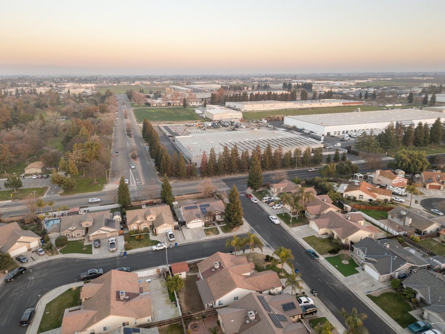 257 Toschi Drive Madera, CA 93637 - Photo 34 of 40 an aerial view of a city with lots of residential buildings