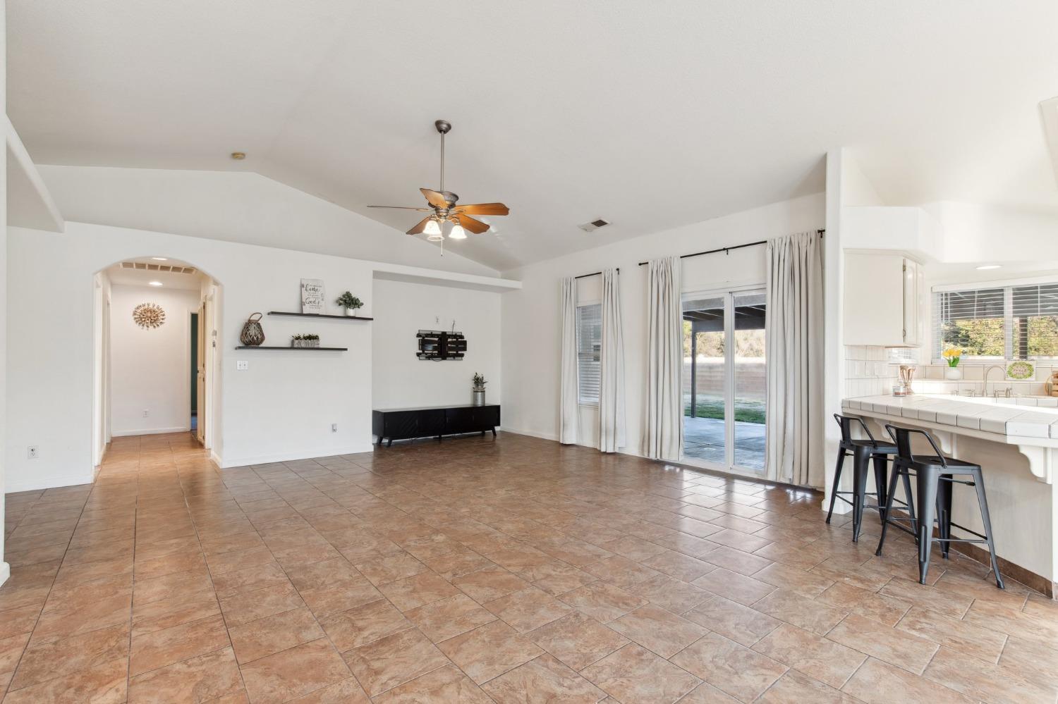 257 Toschi Drive Madera, CA 93637 - Photo 9 of 40 a view of livingroom with furniture and windows