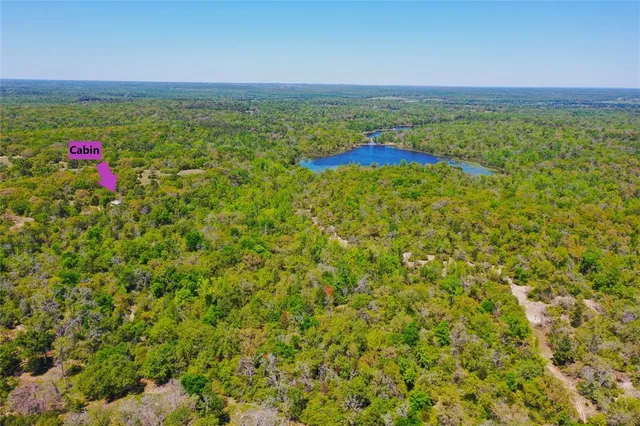 a view of an outdoor space with a lake view and mountain view