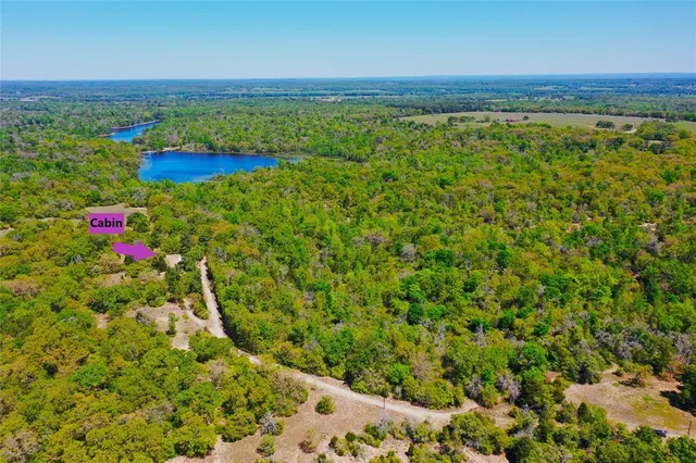 a view of a lake with a city