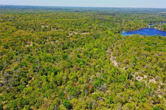 a view of a field with an outdoor space