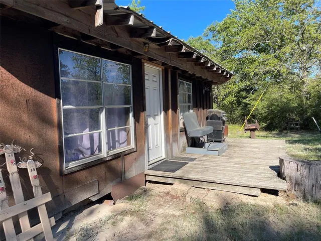 a view of house with outdoor space