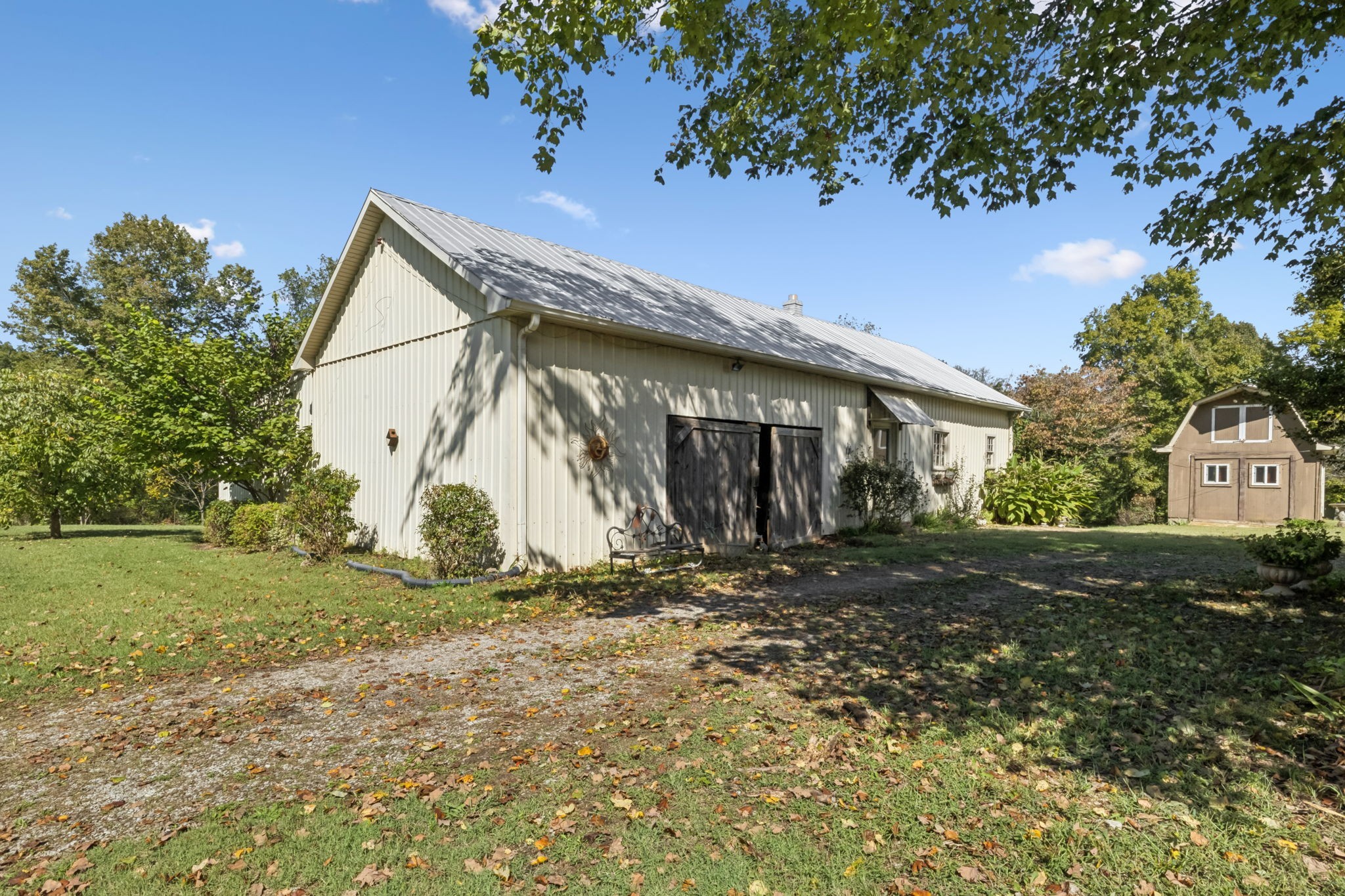 701 Hafner Road Charlotte, TN 37036 - Photo 11 of 52 a view of a house with a yard