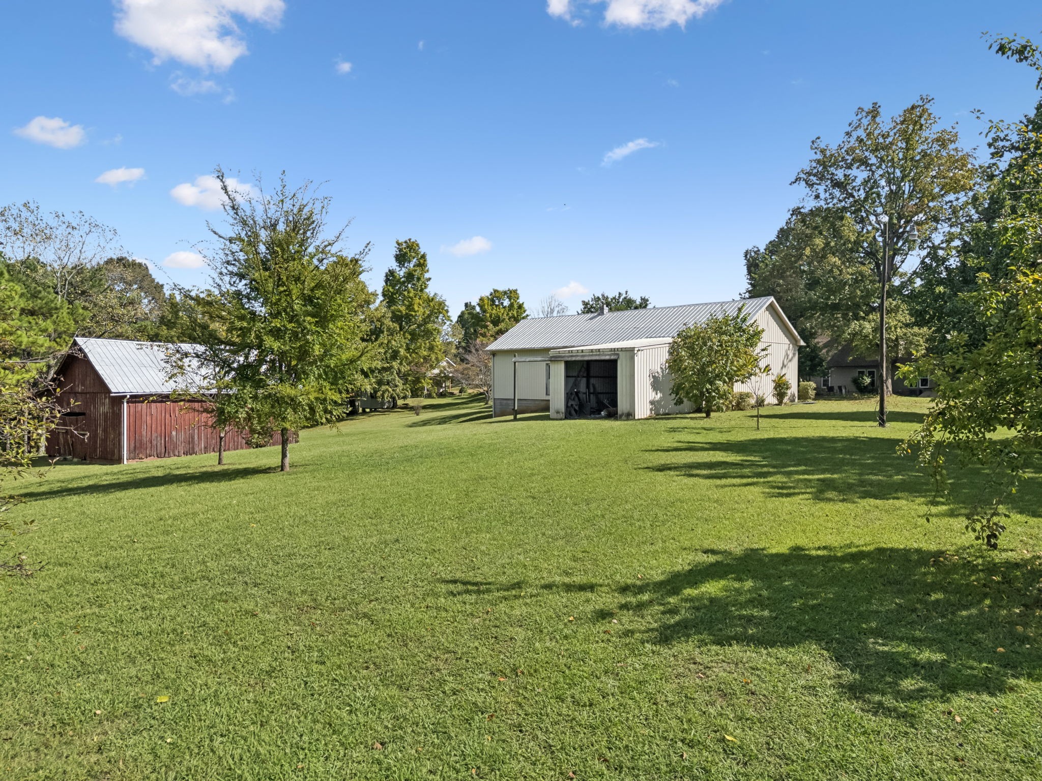 701 Hafner Road Charlotte, TN 37036 - Photo 13 of 52 a view of house with outdoor space and garden