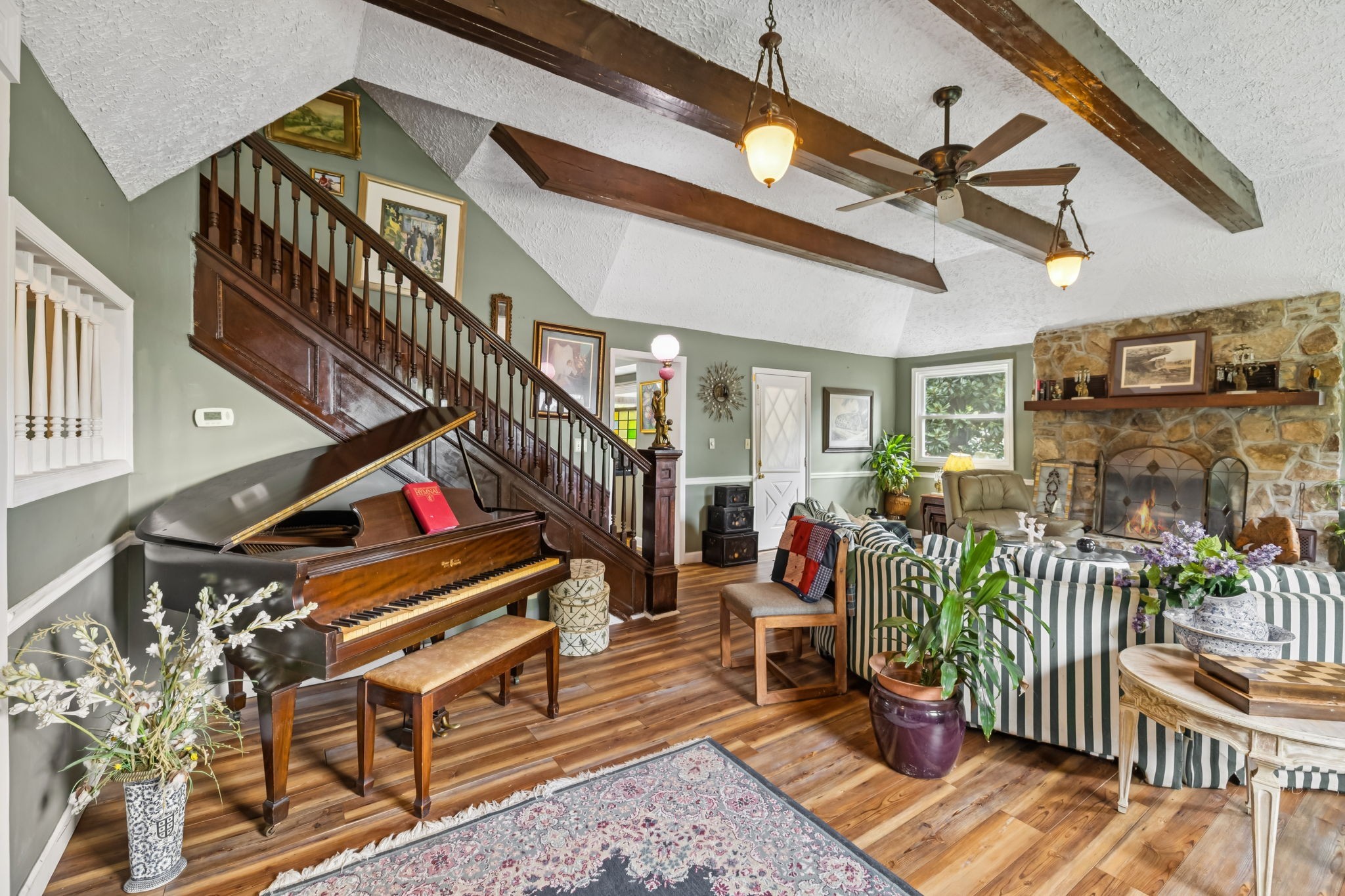 701 Hafner Road Charlotte, TN 37036 - Photo 17 of 52 a view of staircase with furniture and a rug