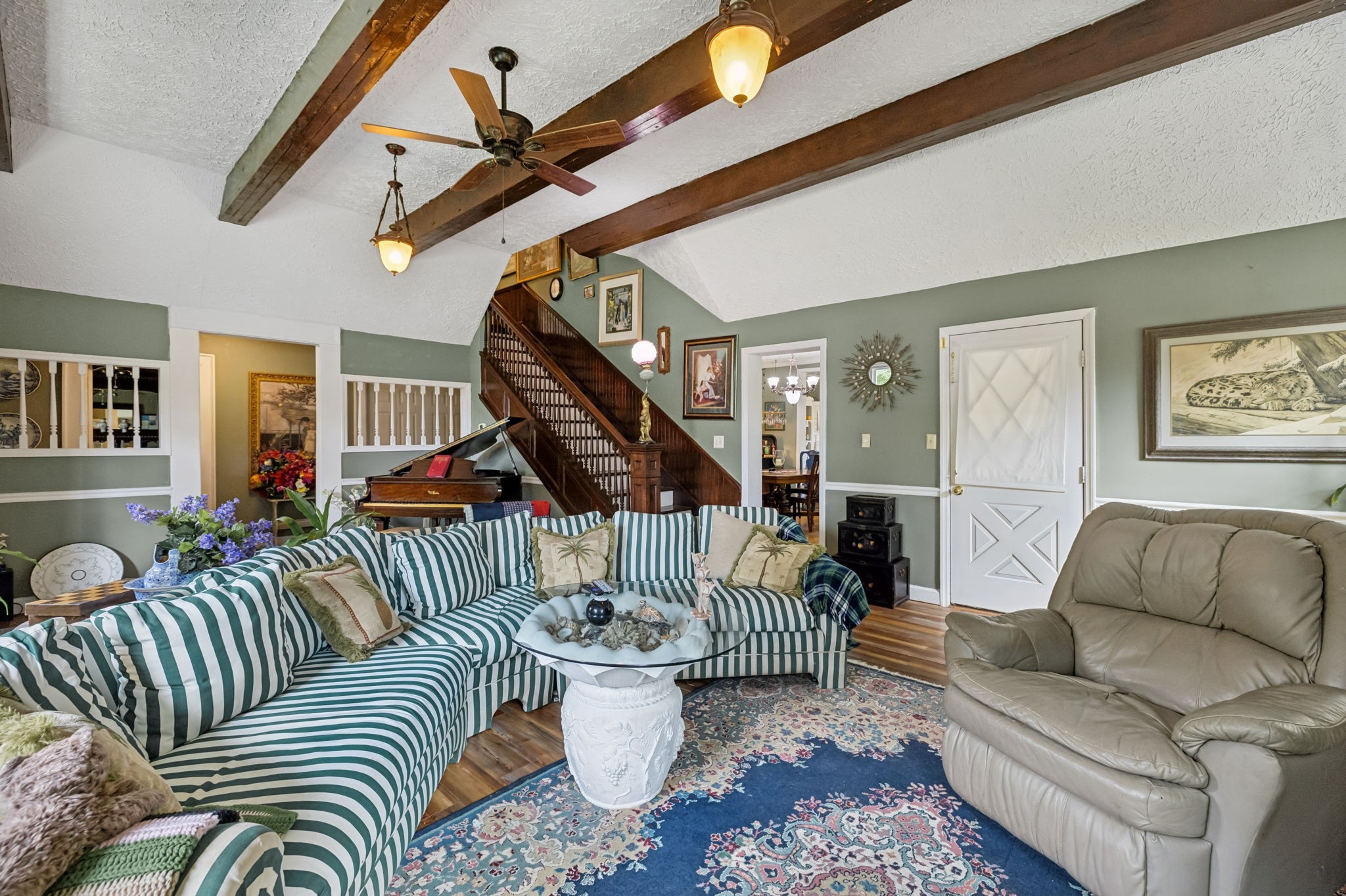 701 Hafner Road Charlotte, TN 37036 - Photo 18 of 52 a living room with furniture and a wooden floor