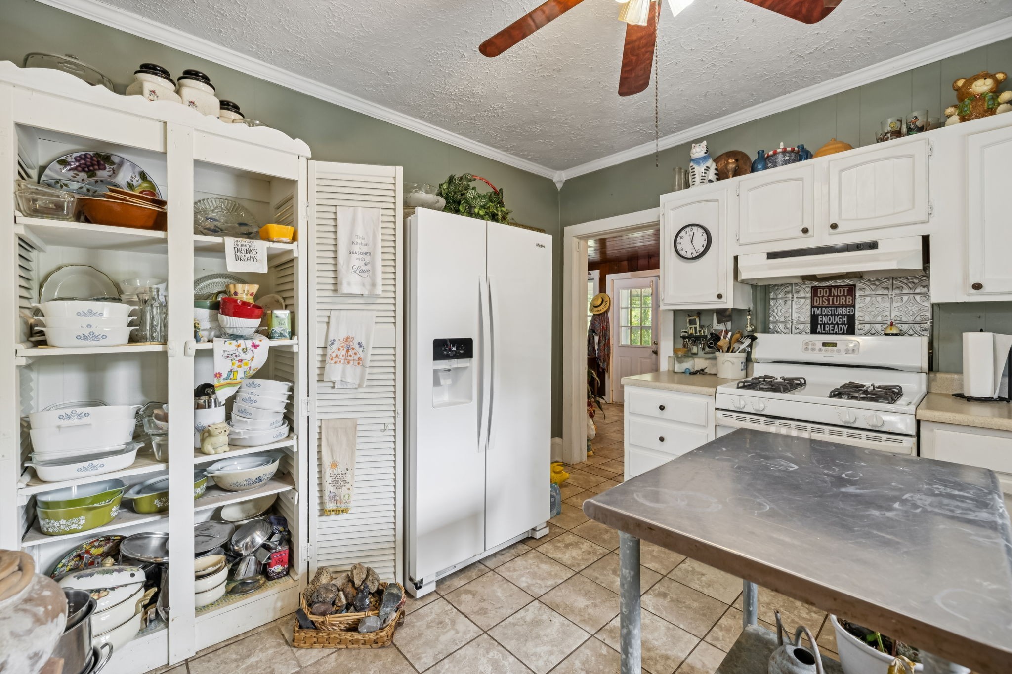 701 Hafner Road Charlotte, TN 37036 - Photo 21 of 52 a kitchen with stainless steel appliances granite countertop a refrigerator and a stove top oven
